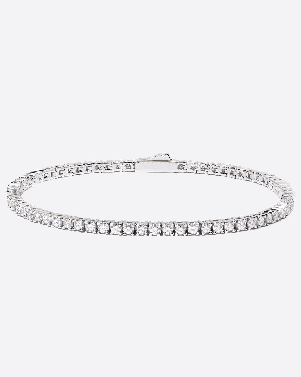 MOISSANITE TENNIS BRACELET. - 2MM WHITE GOLD